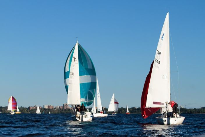 Sailboats with spinnakers racing downwind