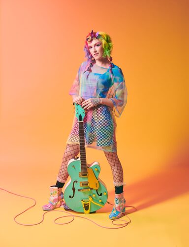 Alanna Sterling posing with guitar