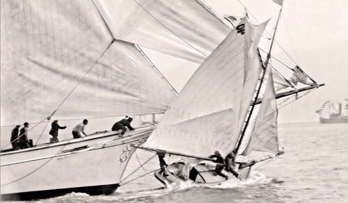 Two sailboats colliding