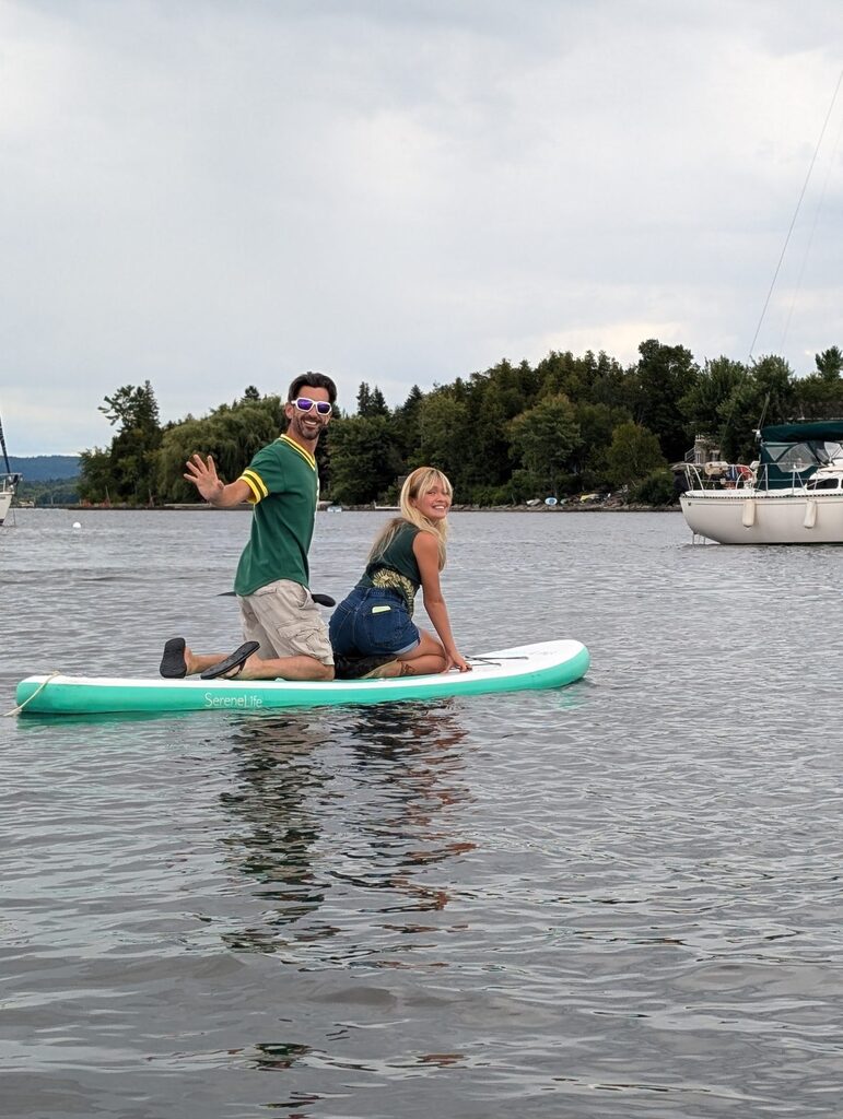 2 people on a paddle board