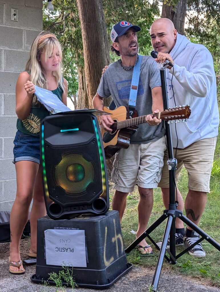 3 people singing