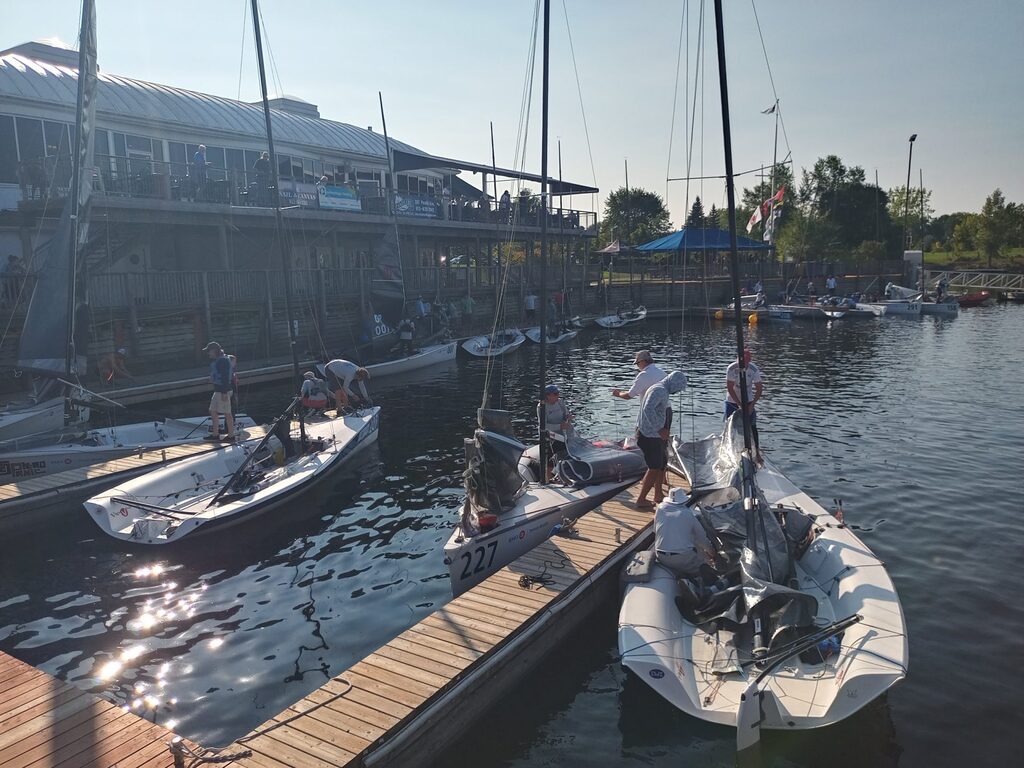 Sailboats tied up at docks