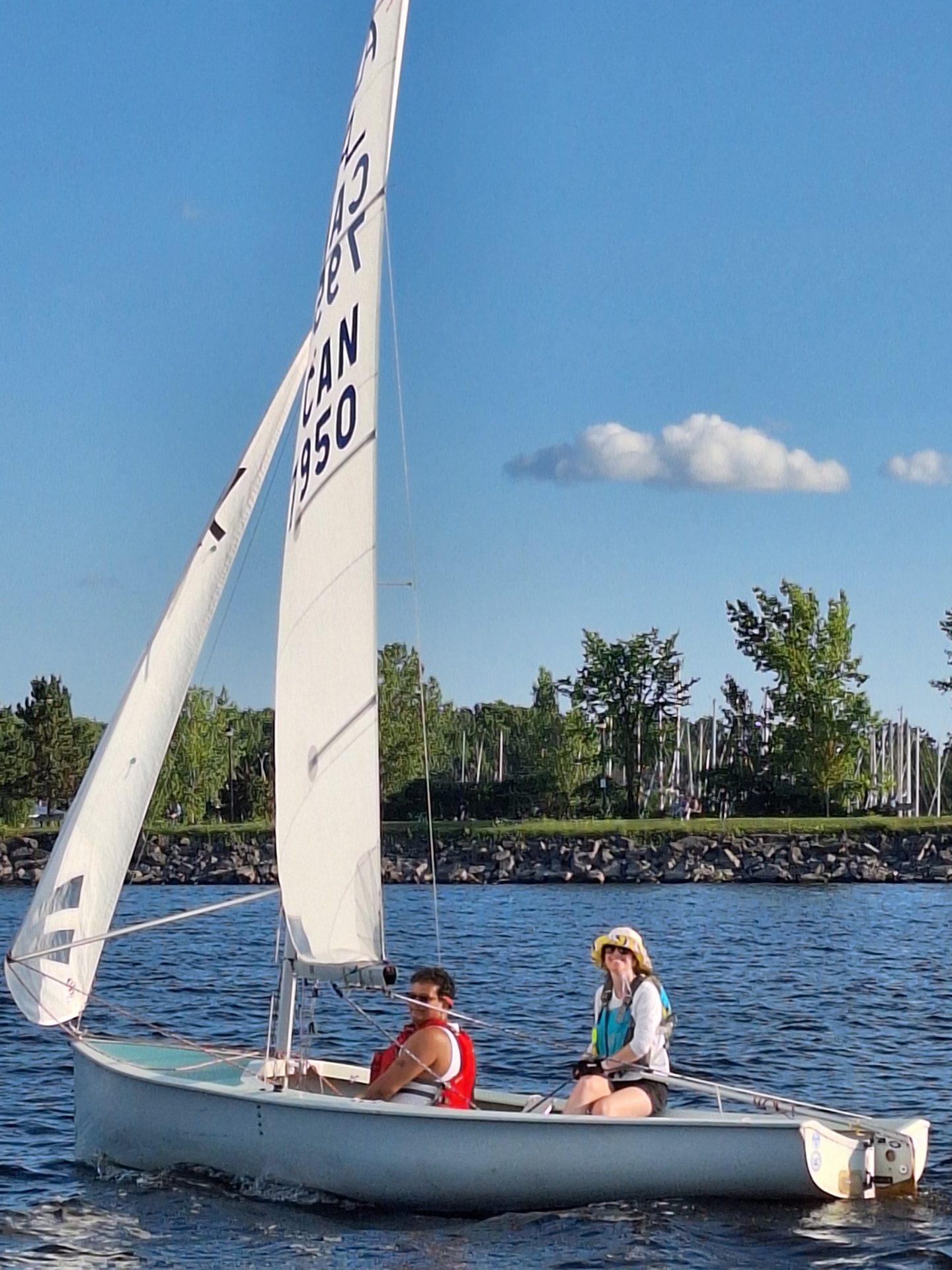 Two sailors sailing in a dinghy