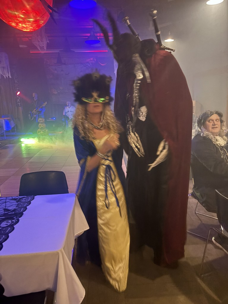 People dressed in Halloween costumes