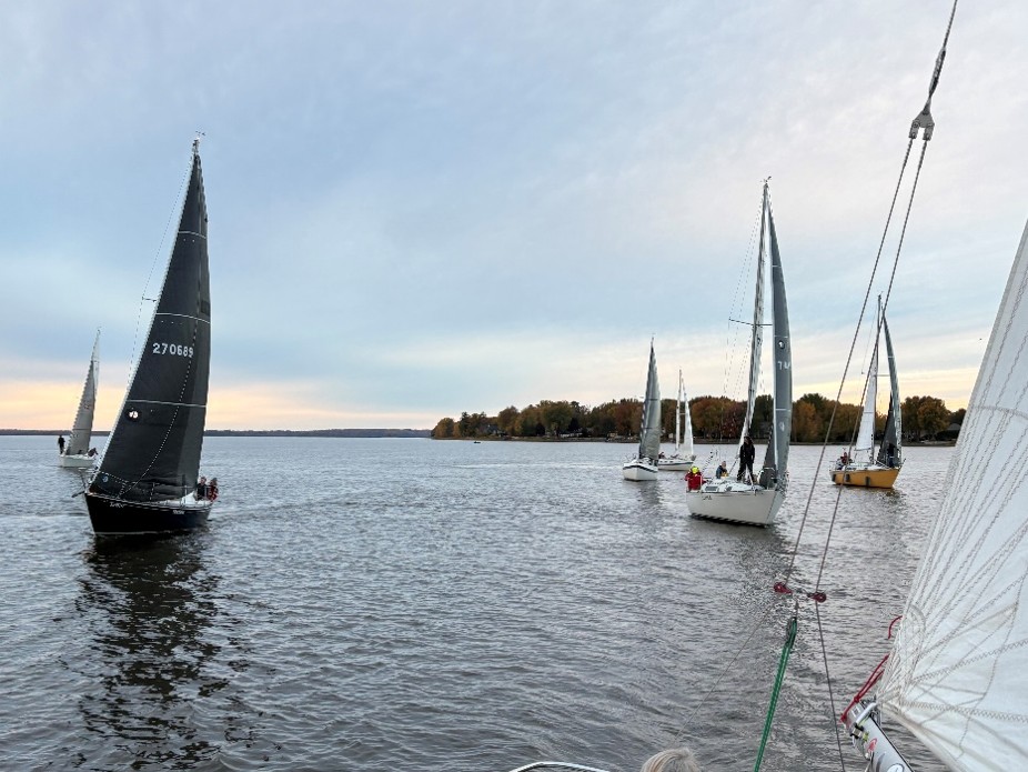 Sailboats sailing toward the camera